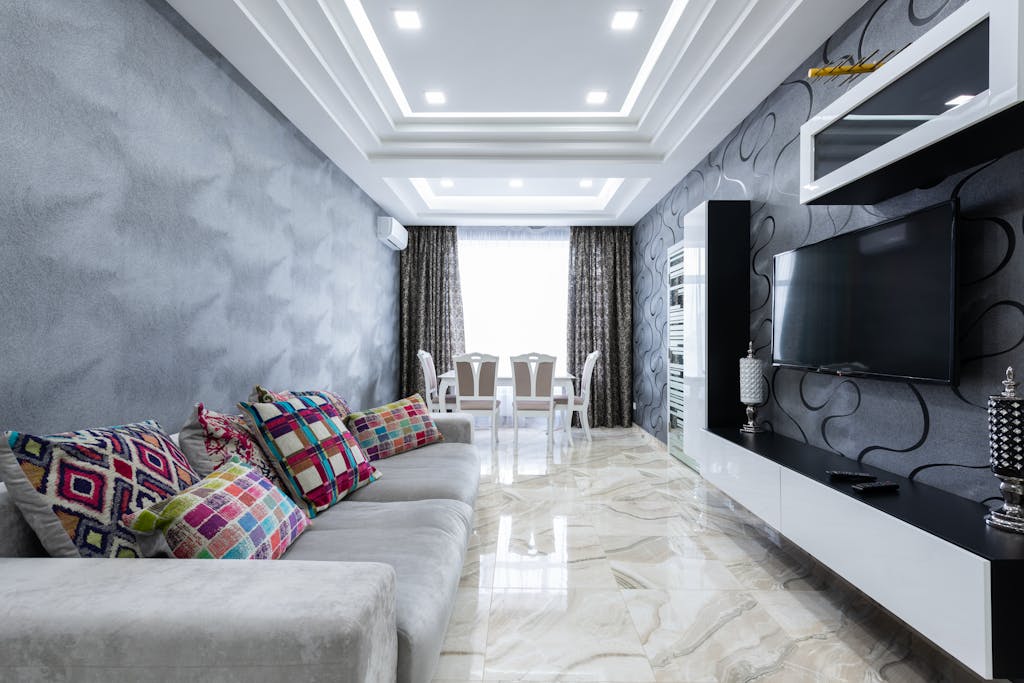 Bright, spacious living room with modern design, luxurious decor, and elegant furniture.